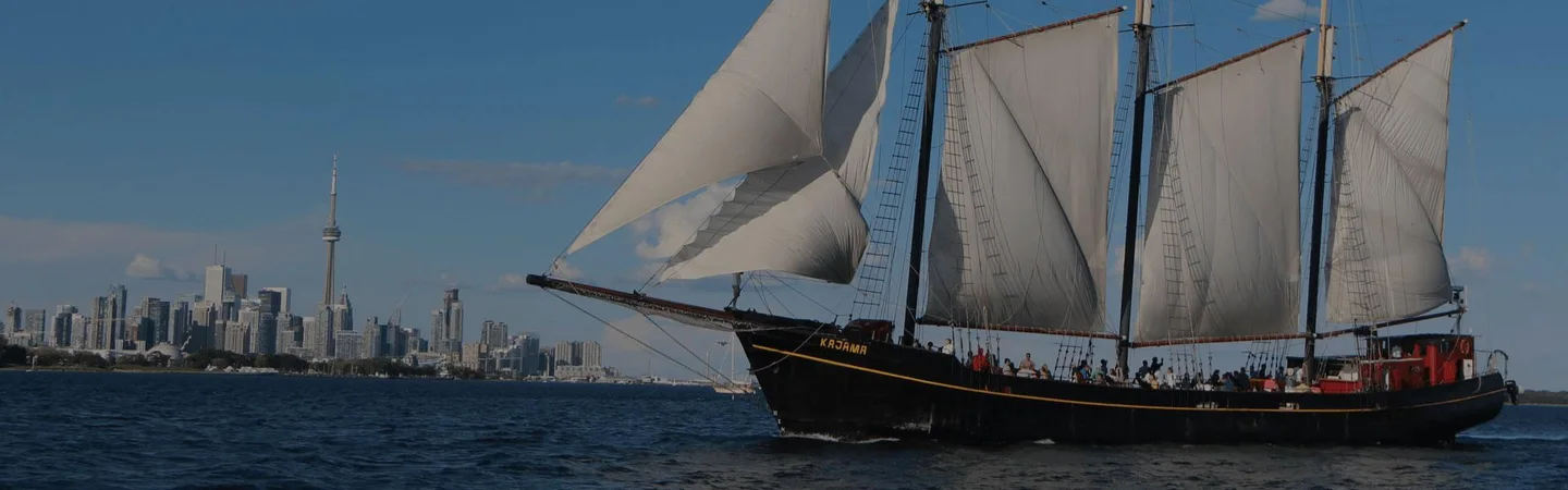 Tall Ship Kajama sailing beside the Toronto waterfront